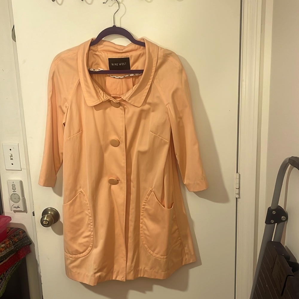 Nine West light weight mid length jacket.